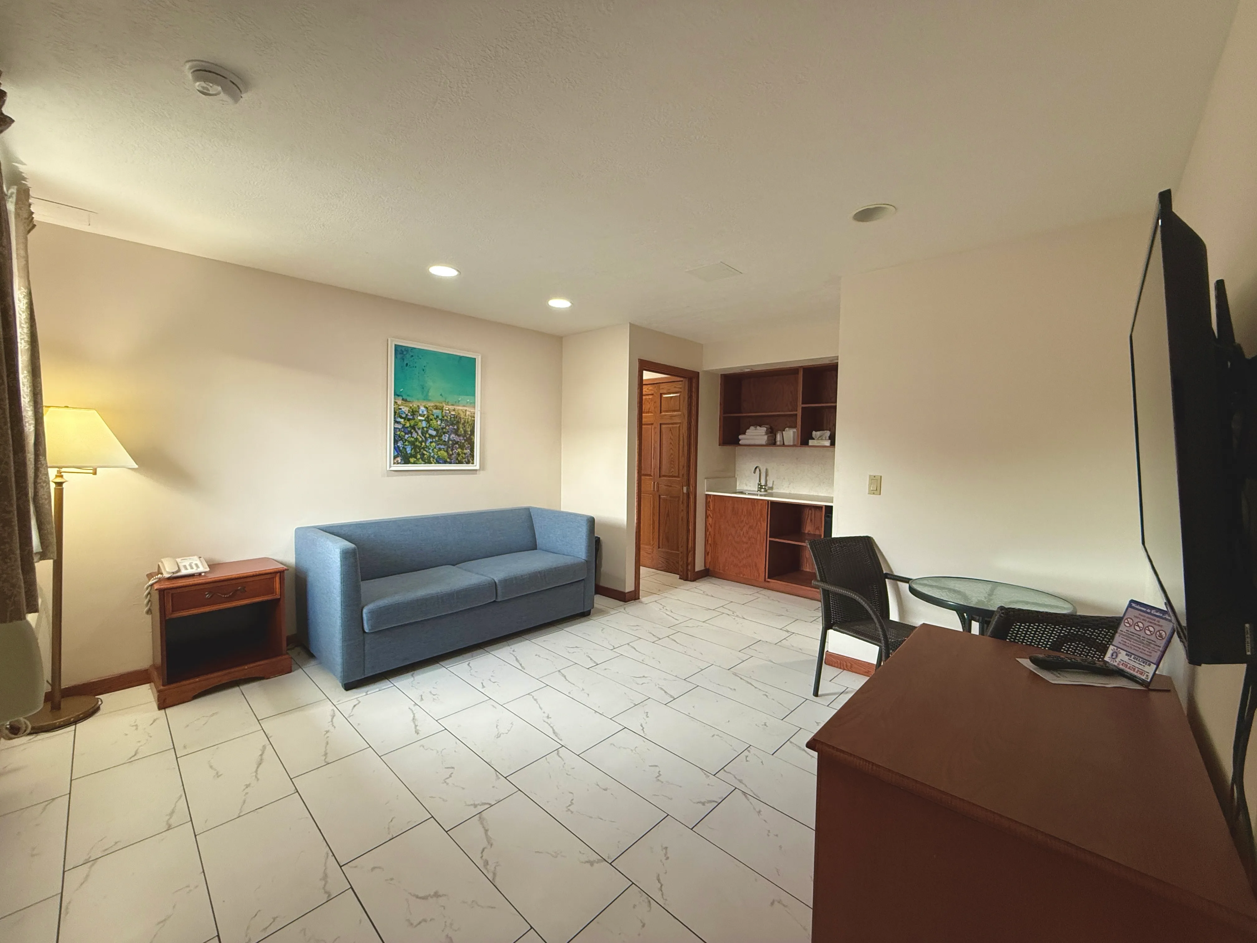 Three Room Suite with Bunks - Living Area with Pull Out Couch at South Shore Inn Sandusky